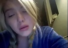A German blonde with pigtails on her head collects tokens in a chat for masturbation