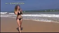 Showed her big boobs on azure beach